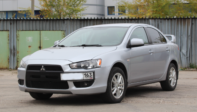 Рамка под номер на передний бампер для Mitsubishi Lancer X (2007-2016)